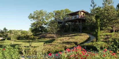 Cabane dans les arbres avec jacuzzi privé
